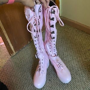 Pink knee high boots